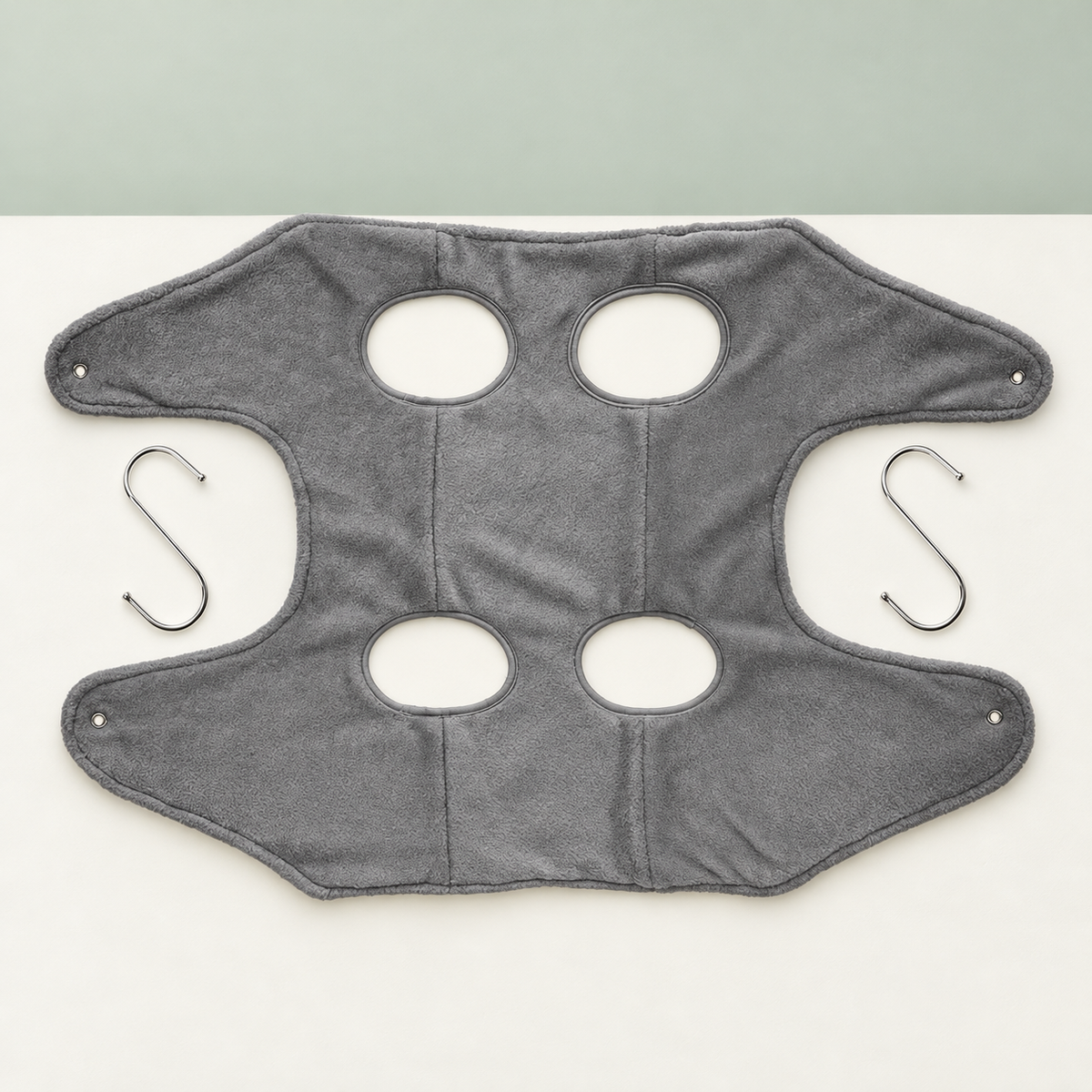 Petaluni pet grooming hammock in Gray on a sage background