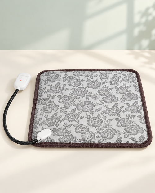 Petaluni pet heating pad in gray floral print with its wired controller
